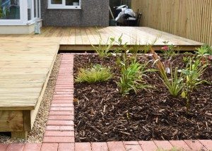 Timber decking specialists in Weymouth, timber decking, Weymouth, garden decking, wooden decking, wooden deck, feature planting